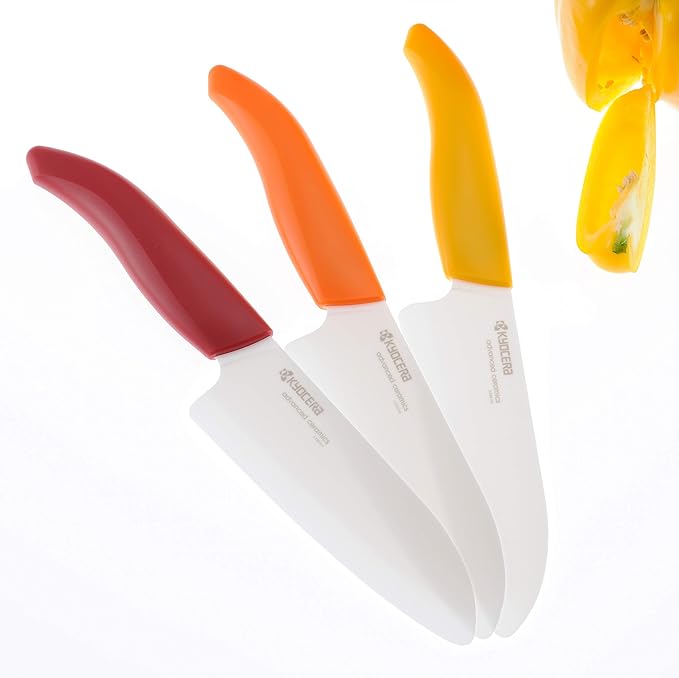 Kyocera’s Revolution Series 5.5” Ceramic Santoku Knife, Chef Knife For Your Cooking Needs, Orange Handle, White Blade