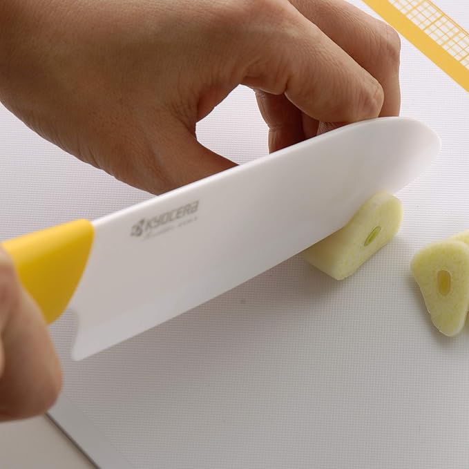 Kyocera’s Revolution Series 5.5” Ceramic Santoku Knife, Chef Knife For Your Cooking Needs, Yellow Handle, White Blade