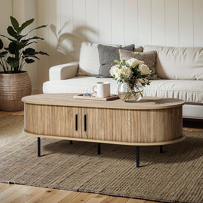 LuxenHome Oval Coffee Table with Storage, 47" Mid Century Modern Fluted Coffee Tables for Living Room, Wooden Sliding Door Boho Storage Center Table for Home, Office